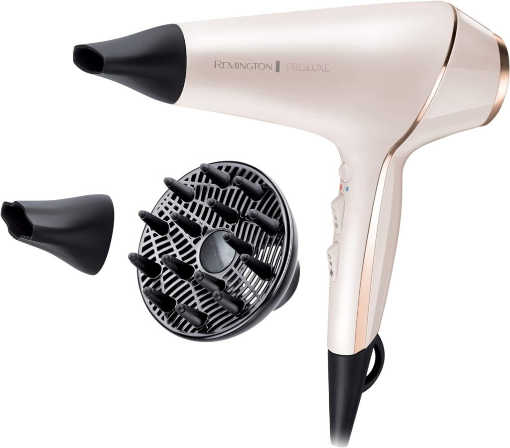 Secador de pelo Remington PROluxe en color blanco y oro rosa, con accesorios incluyendo un difusor y dos concentradores de aire
